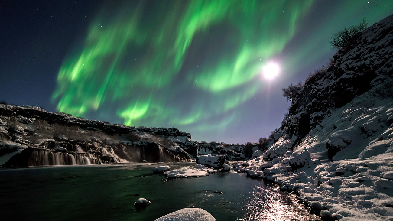 aurora-lake Red Northern Lights over Iceland