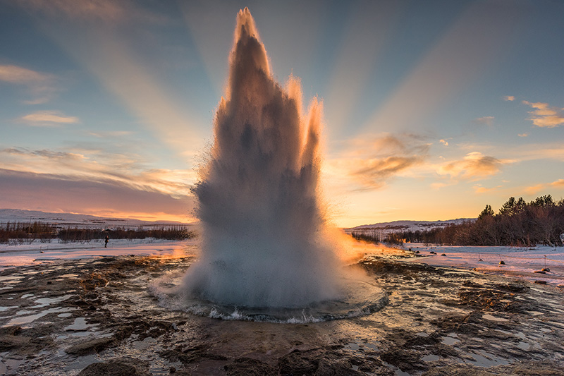 Geysir erupting on a Golden Circle Tour by AURORA REYKJAVÍK