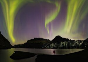 Aurora Expert Grétar Jónsson, owner and CEO of AURORA REYKJAVÍK capturing the Northern Lights at Sólheimarkökull, Iceland