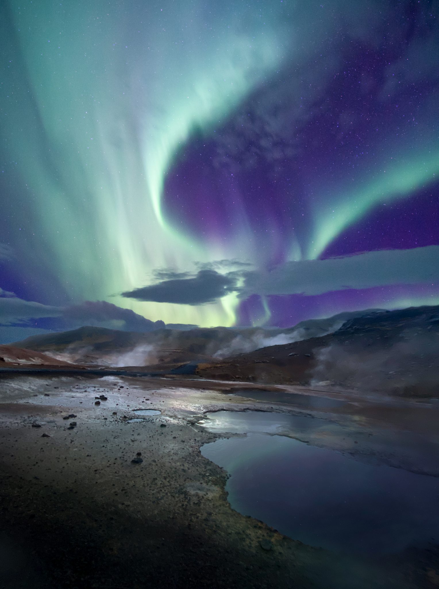 Aurora over Hot spring in Iceland