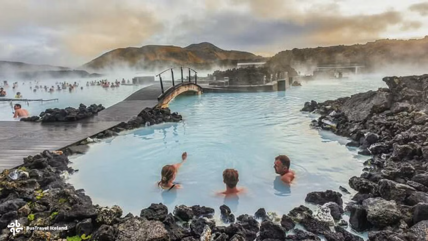 Visitors soaking in the milky-blue steamy waters at the blue lagoon