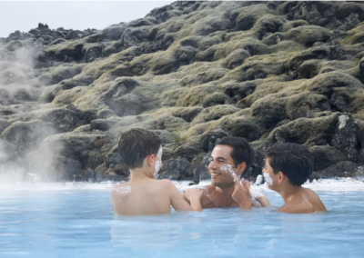 Father and sons relaxing at the Blue Lagoon
