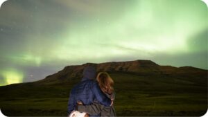 Couple watching the northern lights