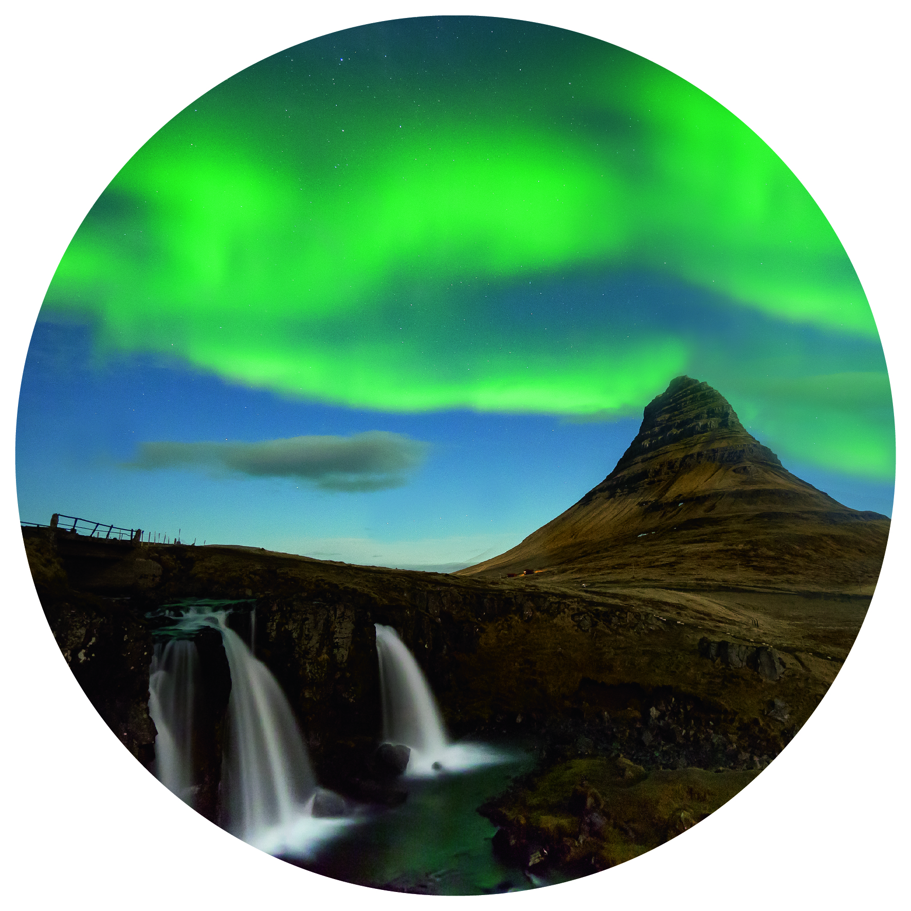 The cone-shaped kirkjufell mountain is the backdrop for the northern lights, dancing over a small waterfall