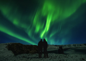 Pair watching the northern lights