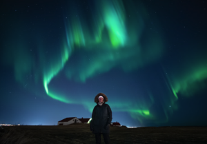 Travellers enjoying the northern lights