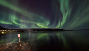 Northern lights over a lake