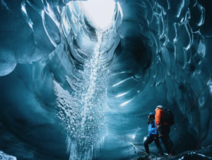 Travellers exploring the Katla ice cave