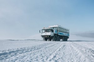 Special glacier monster truck transportation to Into the Glacier