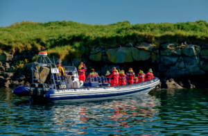 RIB boat along the coastline of one of the Reykjavík bay islands