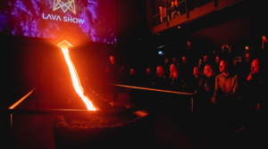 Visitors contemplating lava