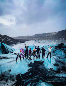 Group posing at glacier