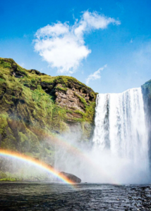 Skógafoss waterfall with rainbow