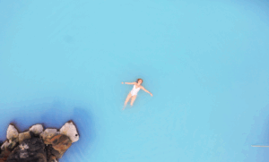 Visitor relaxing at Mývatn Nature Baths