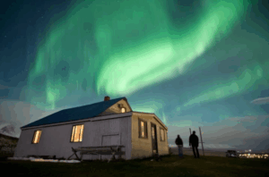 Northern lights over a farm